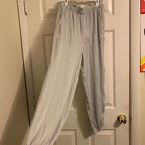 light/flowy pants cuffed at ankle